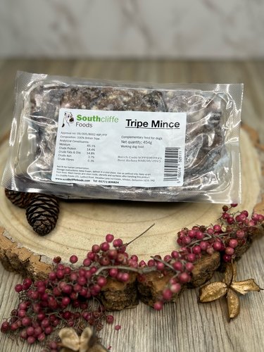 a pack of southcliffe tripe mince dog food on a wooden plate